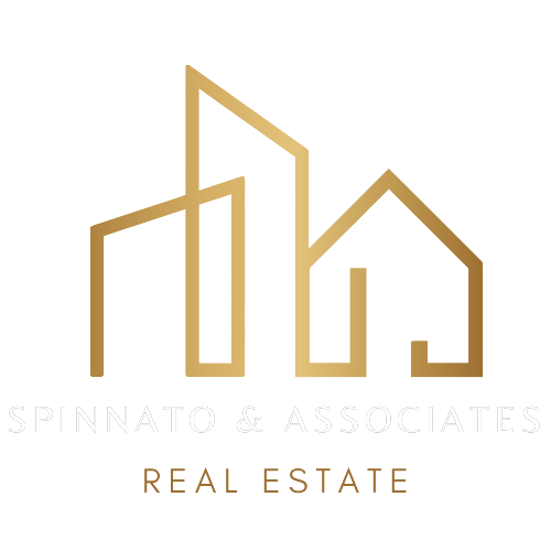 spinnato and associates real estate logo white text